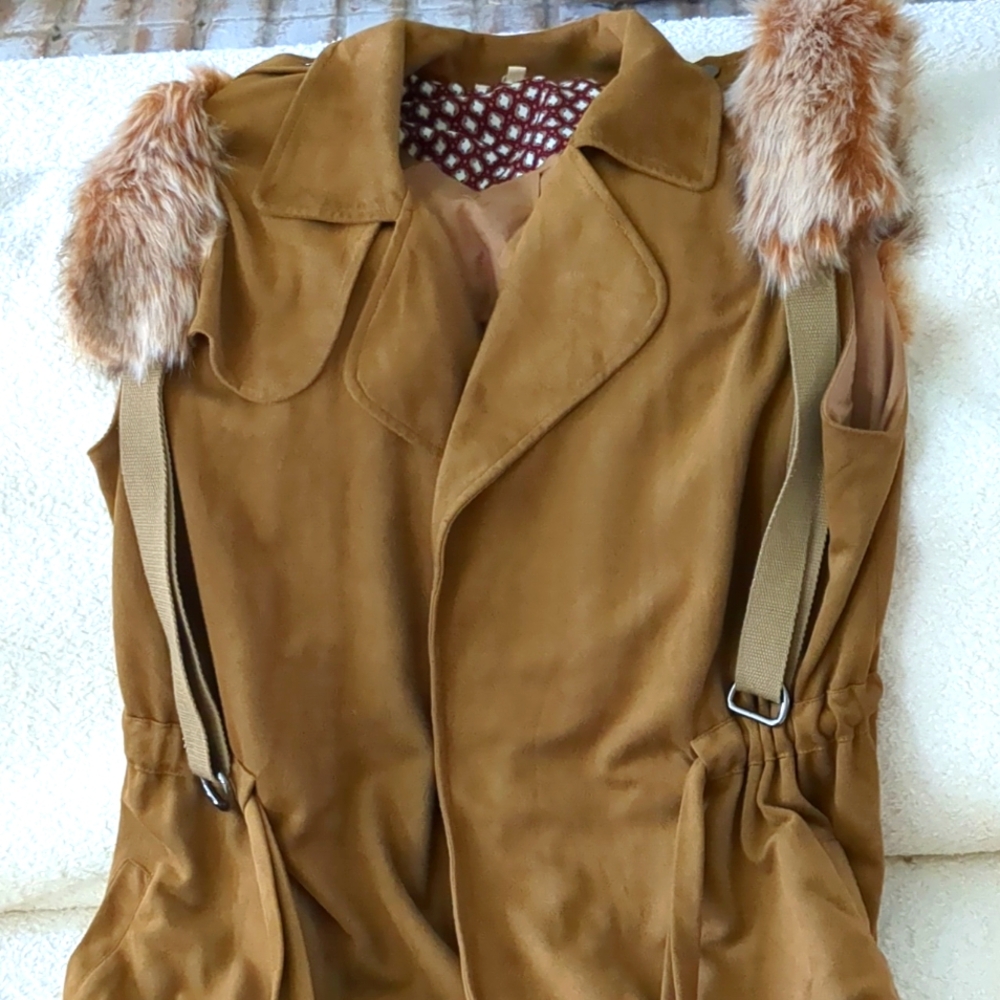 Faux suede vest with faux fox fur . Totally unique and one of a kind.